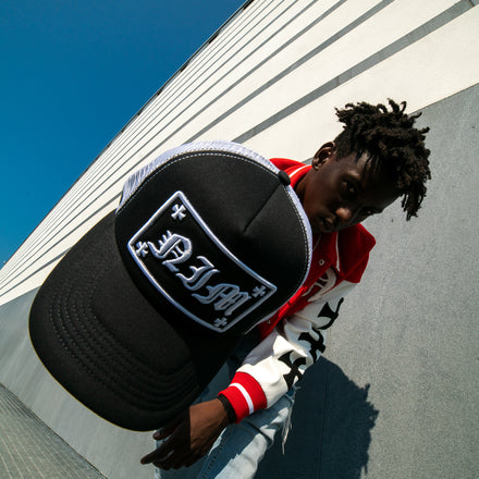 Black and white OG NIM TRUCKER HAT
